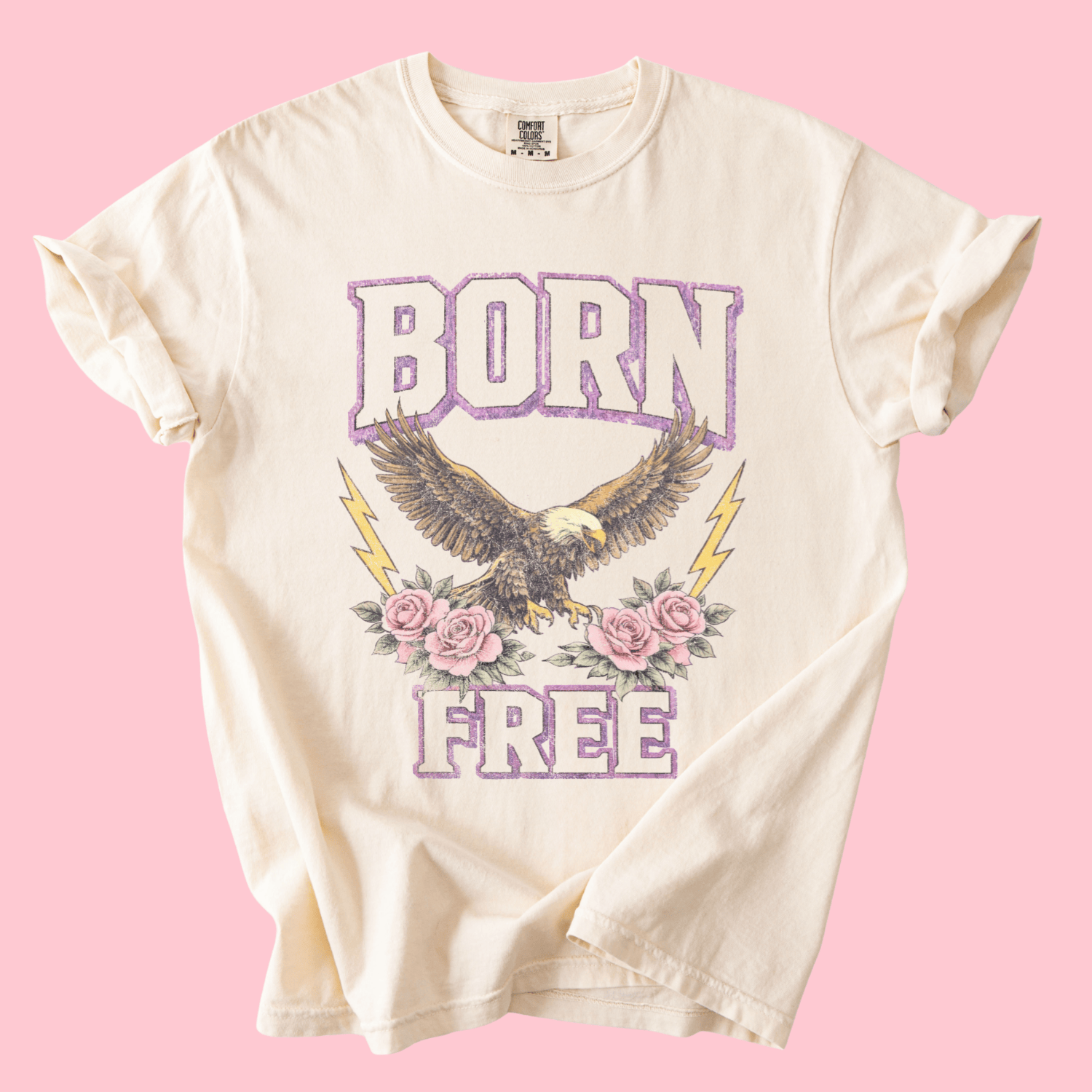 flat lay of Unreleased! Born Free Tee