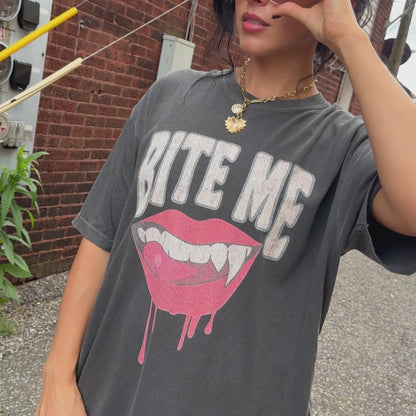 woman wearing bite me tee