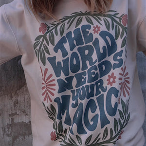 World Needs Your Magic Crewneck