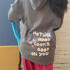 woman wearing motherhood hoodie