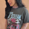 woman wearing I scream you scream