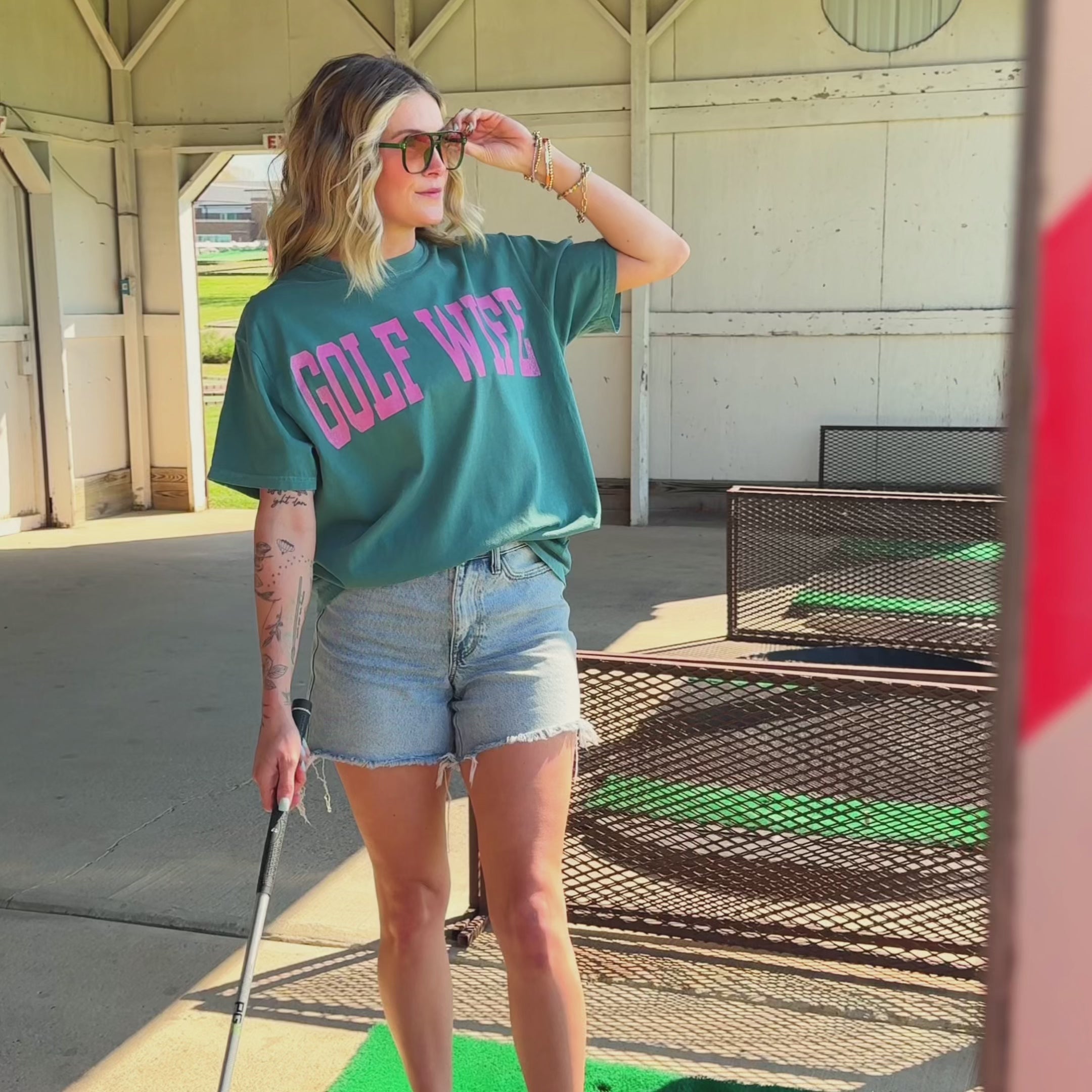 model wearing golf wife tee