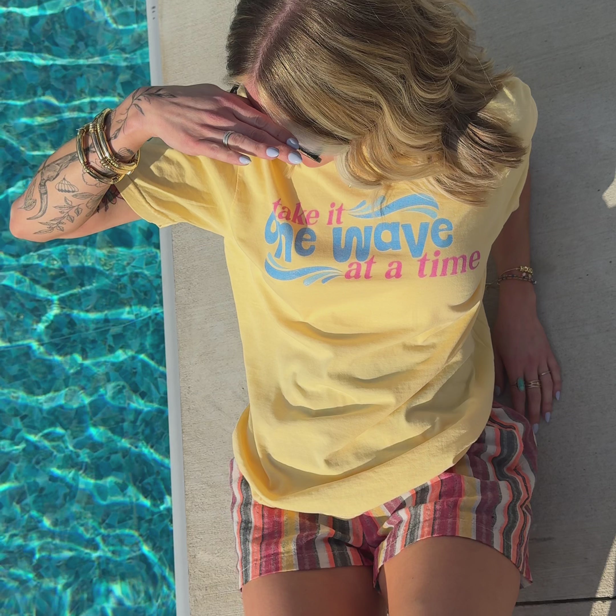 model wearing one wave tee